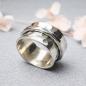 Preview: Handgefertigter Drehring aus 925 Silber mit strukturierter Oberfläche