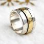 Preview: Drehring Bicolor kombiniert Silber und Gold. 13 mm breit. Gehämmerte Oberfläche.