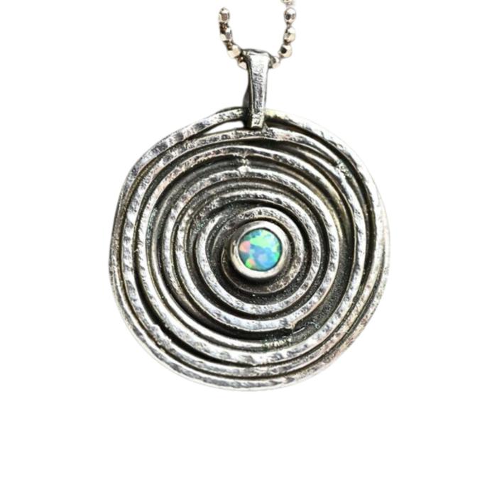 Spiralförmiger Anhänger aus Silber mit synth. Opal